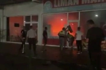 Çıkan yangında marketi küle dönmekten böyle kurtardılar